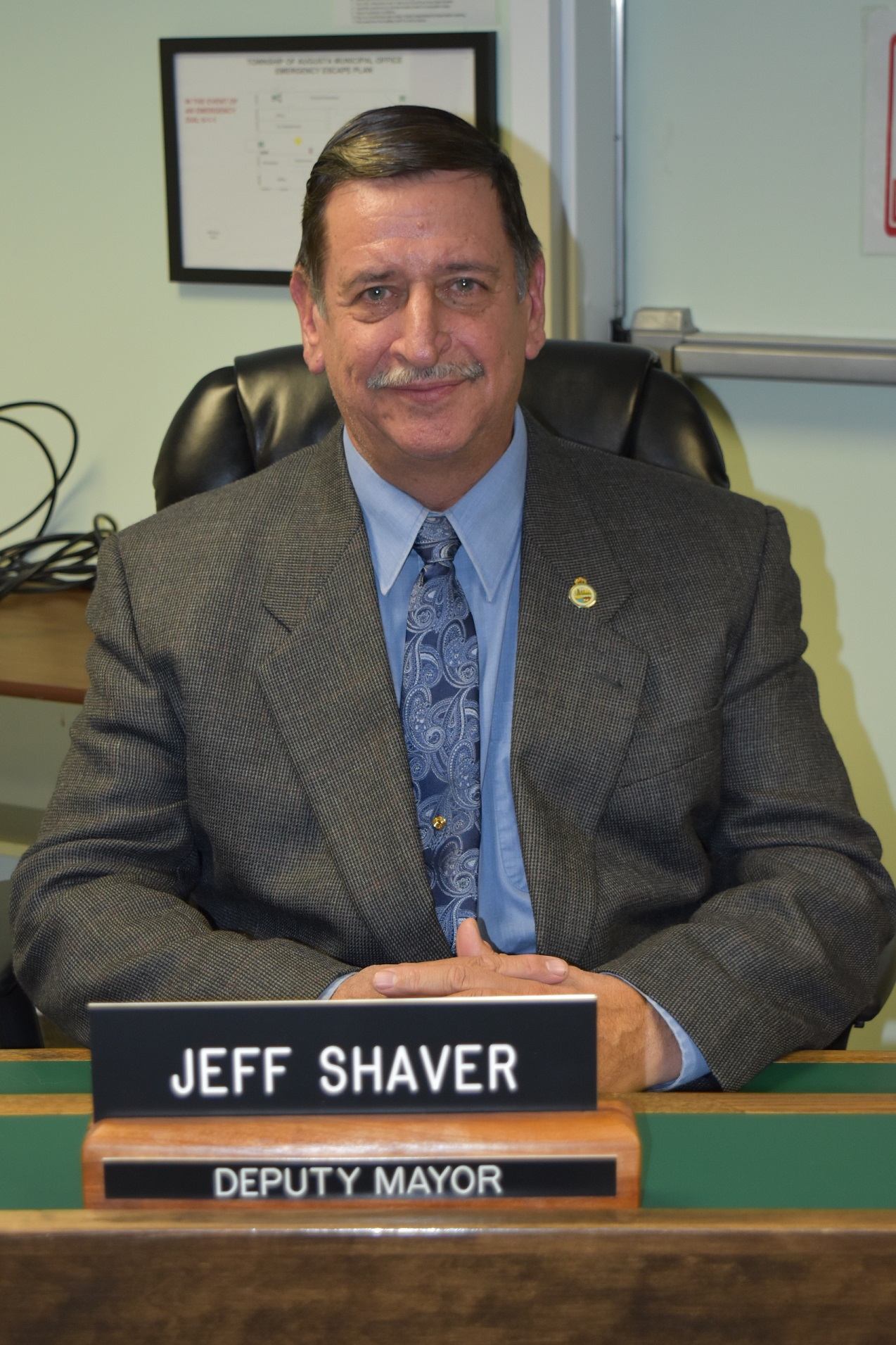 jeff shaver in his seat in the council chambers